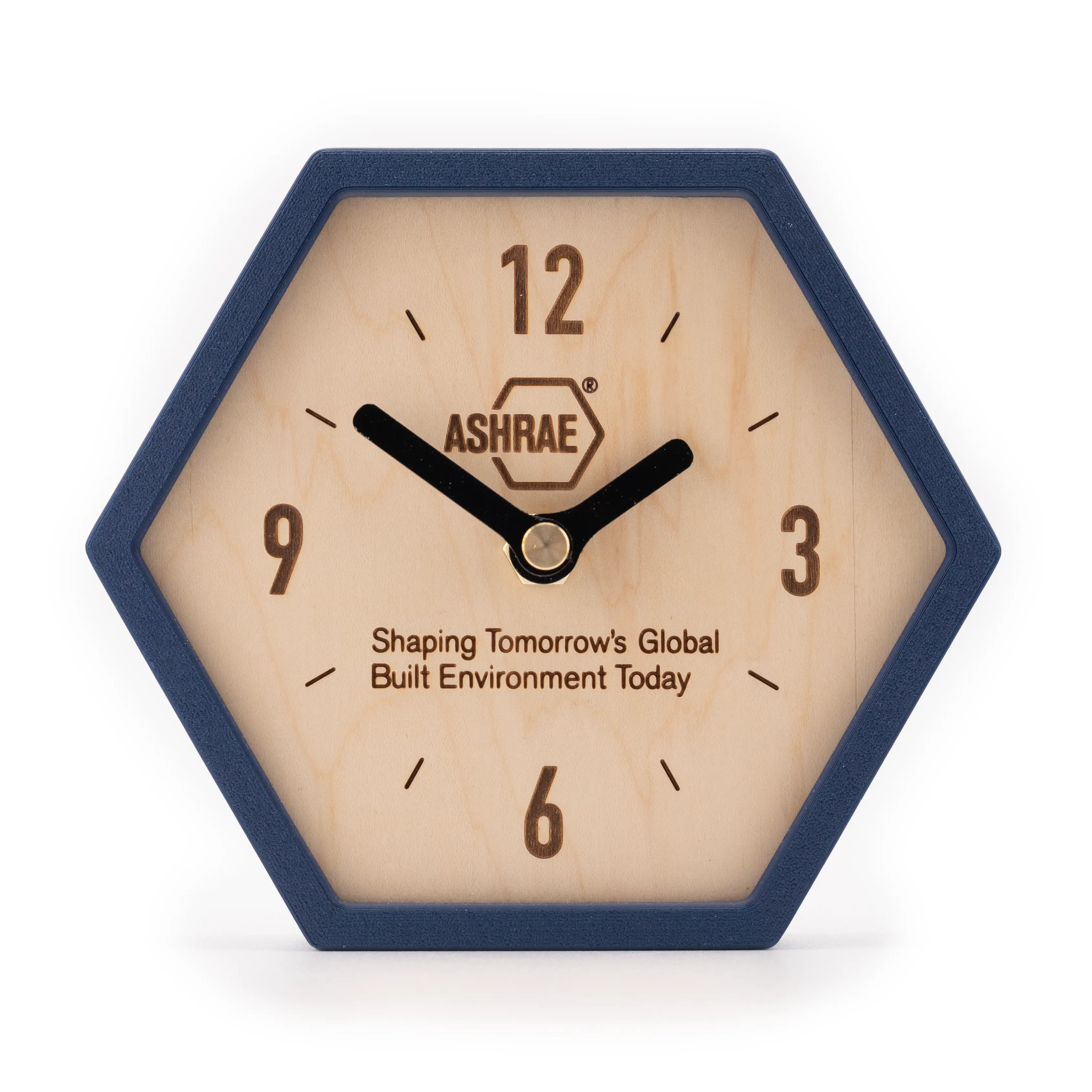 Navy hexagonal desk clock with engraved maple face featuring the ASHRAE logo and tagline.