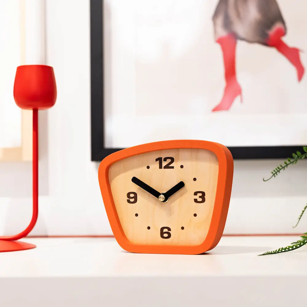 Mid-century modern desk clock with orange frame