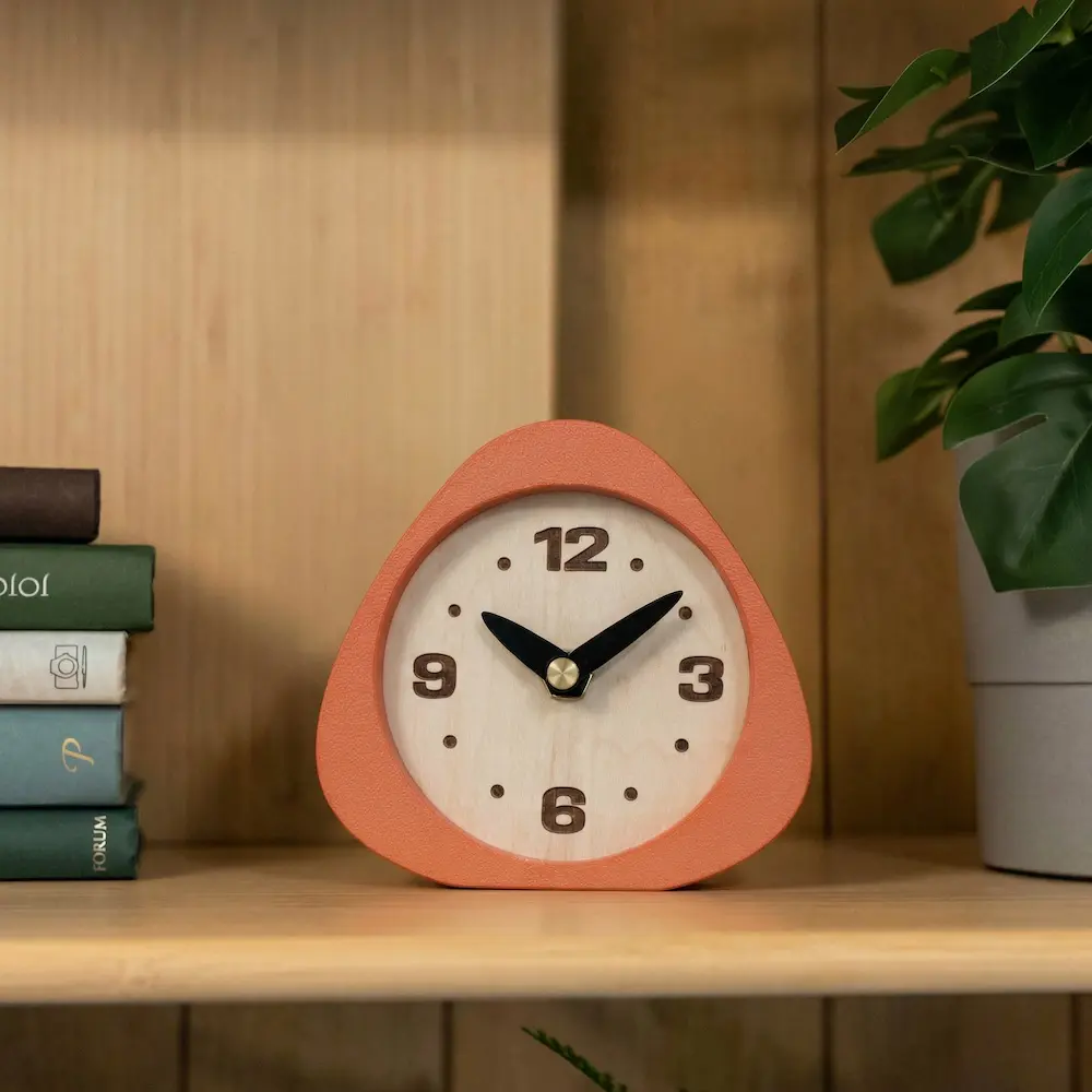 Mid-century modern desk clock with coral frame